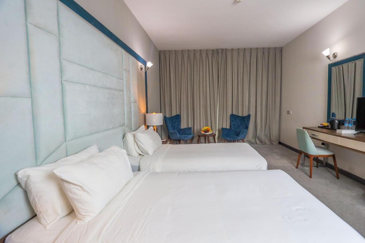 Al Azmy 116 Hotel Шарджа Екстер'єр фото